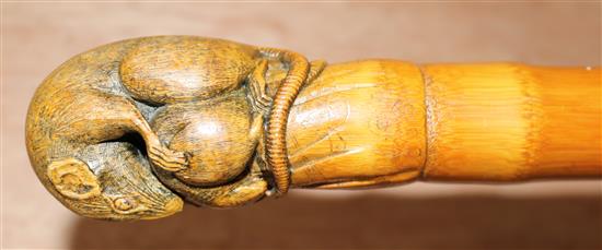 A Japanese carved bamboo walking stick, 36in.